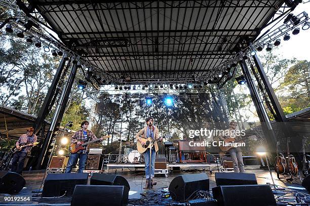 Guitarist Conor Oberst, Vocalist/Guitarist Taylor Hollingsworth and Keyboardist Nate Walcott of The Mystic Valley Band perform during Day 2 of the...