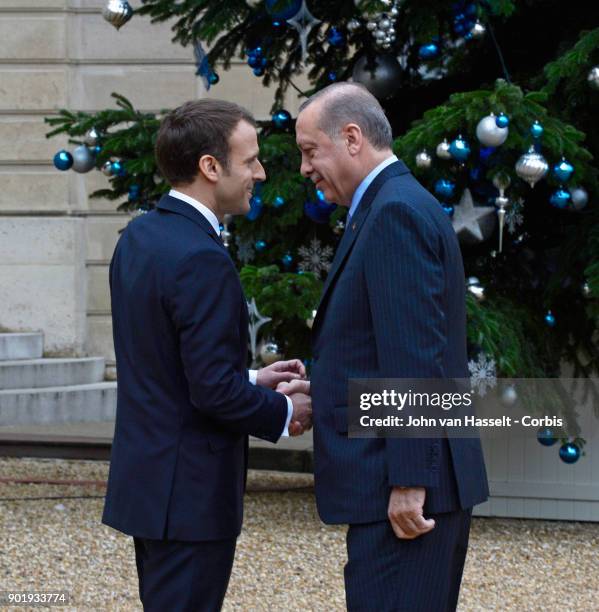 President Emmanuel Macron of France receives Turkish President Recep Tayyip Erdogan at the Elysée Palace on January 5, 2018 in Paris, France. Main...