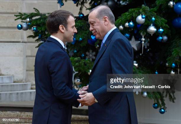 President Emmanuel Macron of France receives Turkish President Recep Tayyip Erdogan at the Elysée Palace on January 5, 2018 in Paris, France. Main...