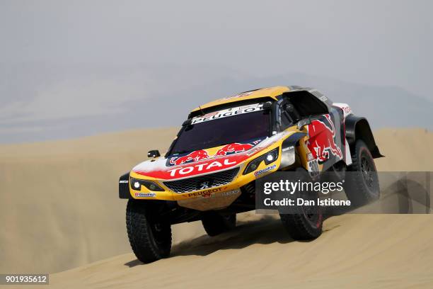 Stephane Peterhansel of France and Peugeot Total drives with co-driver Jean Paul Cottret of France in the 3008 DKR Peugeot car in the Classe : T1.4 2...