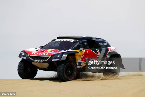 Carlos Sainz of Spain and Peugeot Total drives with co-driver Lucas Cruz of Spain in the 3008 DKR Peugeot car in the Classe : T1.4 2 Roues Motrices,...