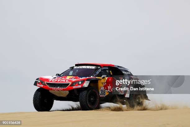 Cyril Despres of France and Peugeot Total drives with co-driver David Castera of France in the 3008 DKR Peugeot car in the Classe : T1.4 2 Roues...