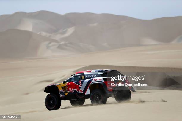 Cyril Despres of France and Peugeot Total drives with co-driver David Castera of France in the 3008 DKR Peugeot car in the Classe : T1.4 2 Roues...