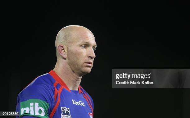 Adam MacDougall of the Knights leaves the field after his team's loss in the round 25 NRL match between the Canberra Raiders and the Newcastle...