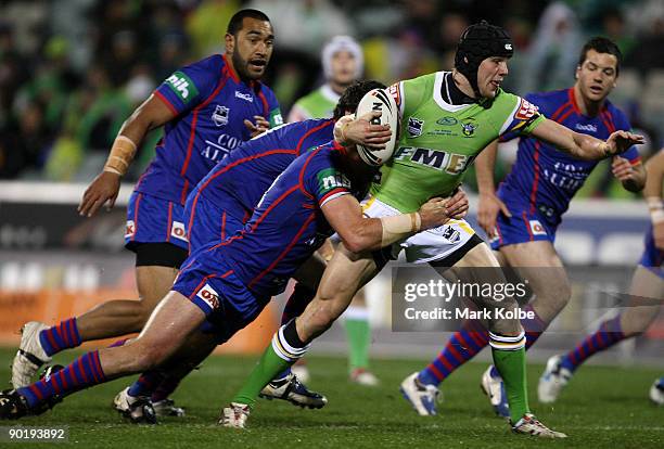 Josh Dugan of the Raiders makes a half break during the round 25 NRL match between the Canberra Raiders and the Newcastle Knights at Canberra Stadium...