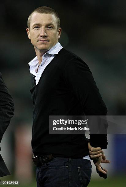 Australian wicket-keeper Brad Haddin looks on during the round 25 NRL match between the Canberra Raiders and the Newcastle Knights at Canberra...