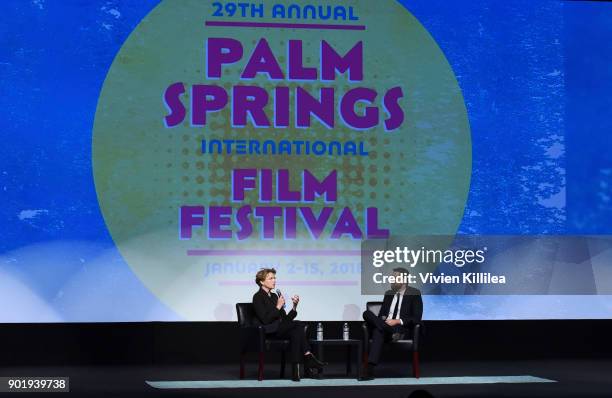Annette Bening and artistic director of the Palm Springs International Film Festival Michael Lerman speak at the 29th Annual Palm Springs...