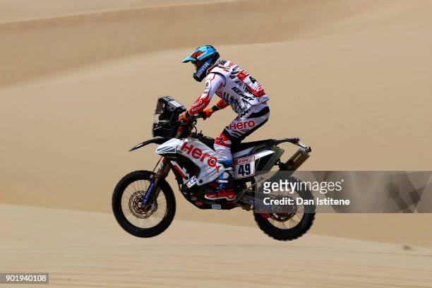 Santosh Chunchunguppe Shivashankar of India and Hero Motorsports rides a 450 Rally Hero bike in the Classe 2.1 : Super Production during stage one of...