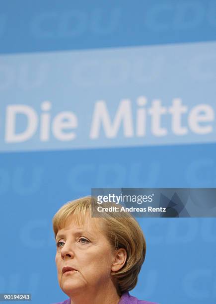 German Chancellor Angela Merkel looks on during a press conference at the CDU headquarter on August 31, 2009 in Berlin, Germany. The preliminary...