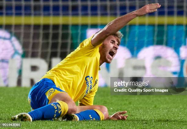 Sergi Samper of Las Palmas lies injured on the pitch during the La Liga match between Las Palmas and Eibar at Estadio Gran Canaria on January 6, 2018...