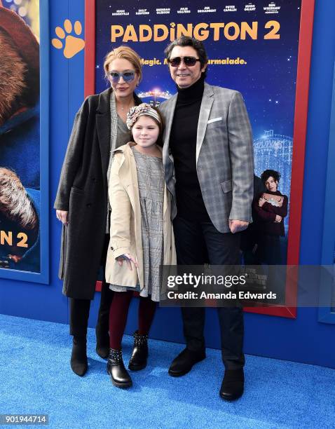 Actress Yvonne Boismier Phillips, Indigo Sanara Phillips and actor Lou Diamond Phillips arrive at the premiere of Warner Bros. Pictures' "Paddington...