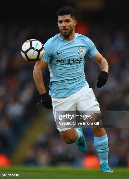 Sergio Aguero of Manchester City in action during The Emirates FA Cup Third Round match between Manchester City and Burnley at Etihad Stadium on...