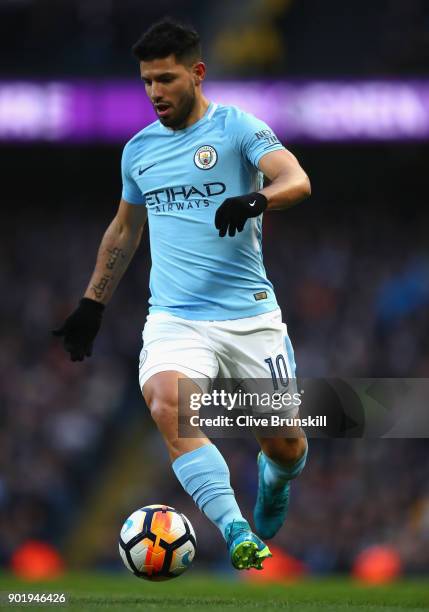 Sergio Aguero of Manchester City in action during The Emirates FA Cup Third Round match between Manchester City and Burnley at Etihad Stadium on...