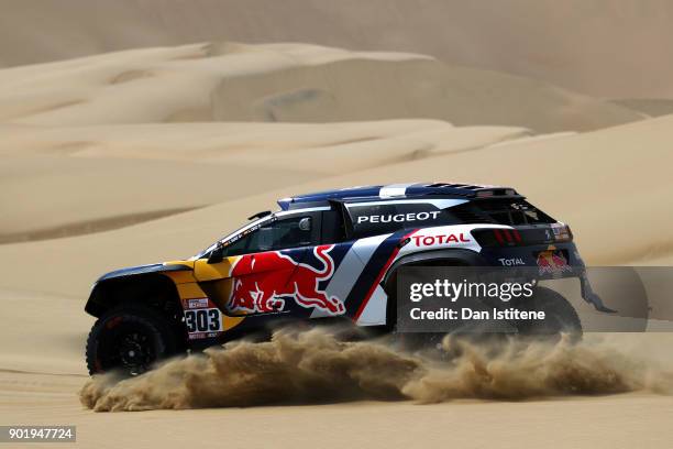 Carlos Sainz of Spain and Peugeot Total drives with co-driver Lucas Cruz of Spain in the 3008 DKR Peugeot car in the Classe : T1.4 2 Roues Motrices,...