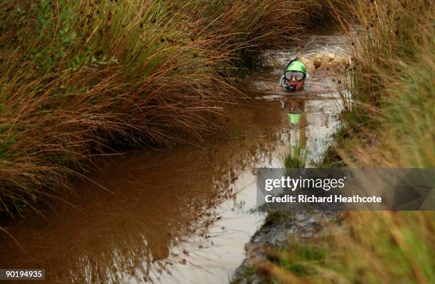 Competitor takes part in the World Bog Snorkelling Championships held at Waen Rhydd Bog on August 31, 2009 in Llanwrtyd Wells, Wales.