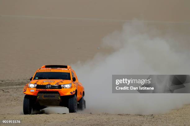 Maik Willems of the Netherlands and Bastian Hotels Dakar Team drives with co-driver Robert van Pelt of the Netherlands in the Hilux Toyota car in the...