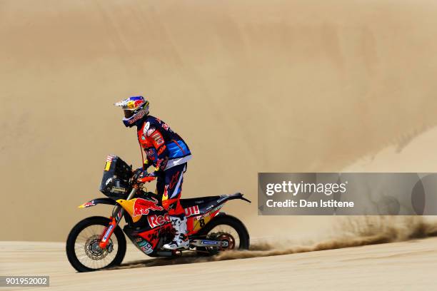 Toby Price of Australia and Red Bull KTM Team rides a 450 Rally Replica bike in the Elite ASO during stage one of the 2018 Dakar Rally between Lima...