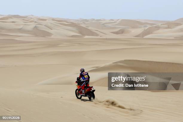 Toby Price of Australia and Red Bull KTM Team rides a 450 Rally Replica bike in the Elite ASO during stage one of the 2018 Dakar Rally between Lima...