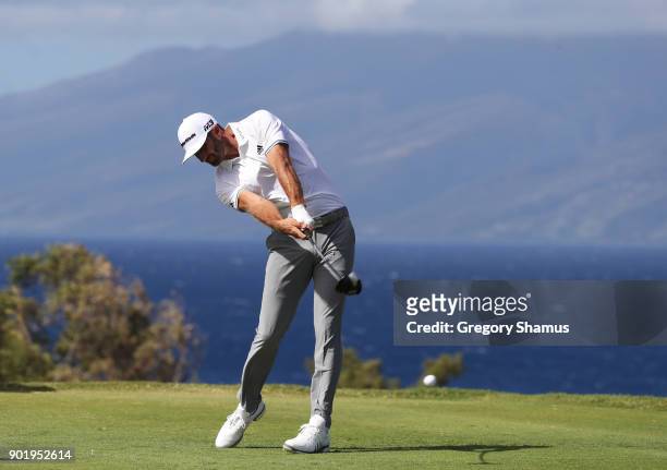 Dustin Johnson of the United States plays his shot from the 13th tee during the third round of the Sentry Tournament of Champions at Plantation...