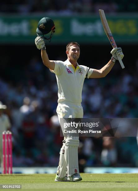 Shaun Marsh celebrates after reaching his century during day four of the Fifth Test match in the 2017/18 Ashes Series between Australia and England...