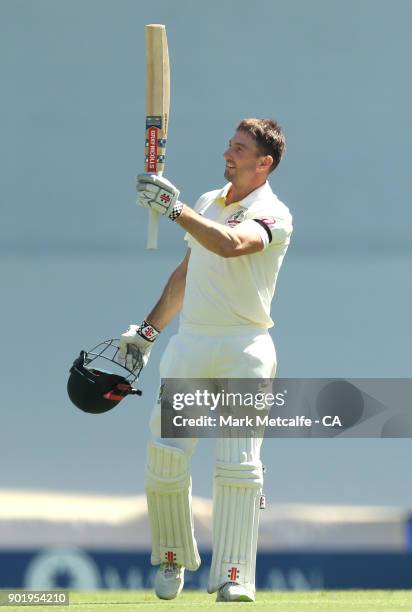 Shaun Marsh of Australia celebrates and acknowledges the crowd after scoring a century during day four of the Fifth Test match in the 2017/18 Ashes...