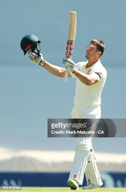 Shaun Marsh of Australia celebrates and acknowledges the crowd after scoring a century during day four of the Fifth Test match in the 2017/18 Ashes...