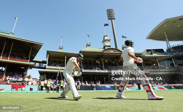 Shaun Marsh of Australia and Mitch Marsh of Australia walk out to bat during day four of the Fifth Test match in the 2017/18 Ashes Series between...
