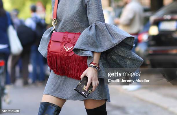 Lisa Hahnbueck wearing a Fendi bag, Louis Vuitton iPhone Case on September 21, 2017 in Milan .