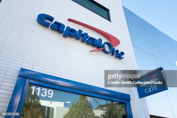Sign on facade of CapitalOne cafe, a combined cafe and banking center in downtown Walnut Creek, California, November 17, 2017.