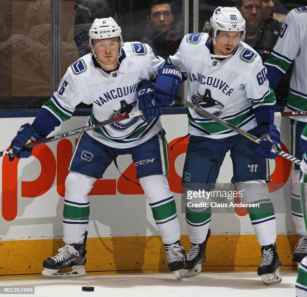 Brock Boeser and Markus Granlund of the Vancouver Canucks warm up prior to playing against the Toronto Maple Leafs in an NHL game at the Air Canada...