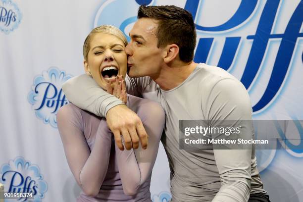 Alexa Scimeca-Knierim and Christopher Knierim celebrate in the kiss and cry after the Championship Pairs during the 2018 Prudential U.S. Figure...