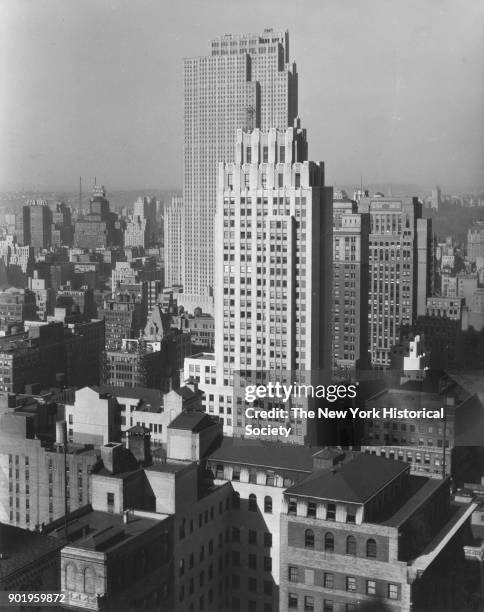 View of rooftops, looking northwest towards Rockefeller Center and the Park Central Hotel, from just south of the Lefcourt Colonial Building on 41st...