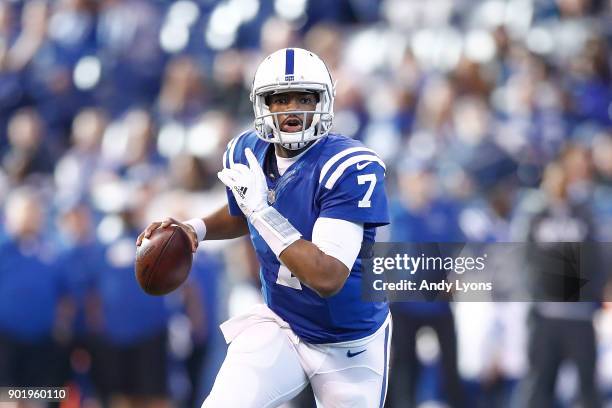 Jacoby Brissett of the Indianapolis Colts looks to pass against the Houston Texans during the first half at Lucas Oil Stadium on December 31, 2017 in...