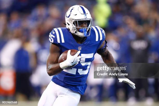 Marlon Mack of the Indianapolis Colts runs with the ball against the Houston Texans during the second half at Lucas Oil Stadium on December 31, 2017...