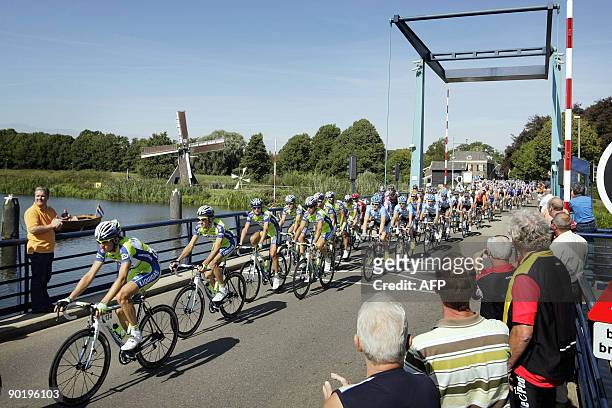 The Vuelta cycling pack rides across a bridge over the Old IJssel in Laag Keppel, The Netherlands, on August 31 2009 in the third stage from Zutphen...