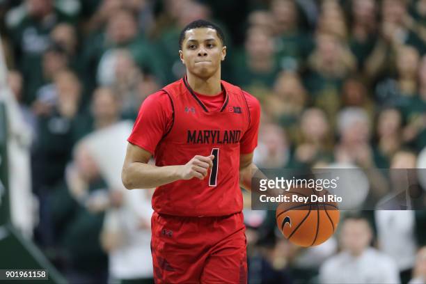Anthony Cowan Jr. #1 of the Maryland Terrapins brings the ball up court during the game against the Michigan State Spartans at Breslin Center on...