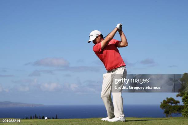 Brian Harman of the United States plays his shot from the 17th tee during the third round of the Sentry Tournament of Champions at Plantation Course...