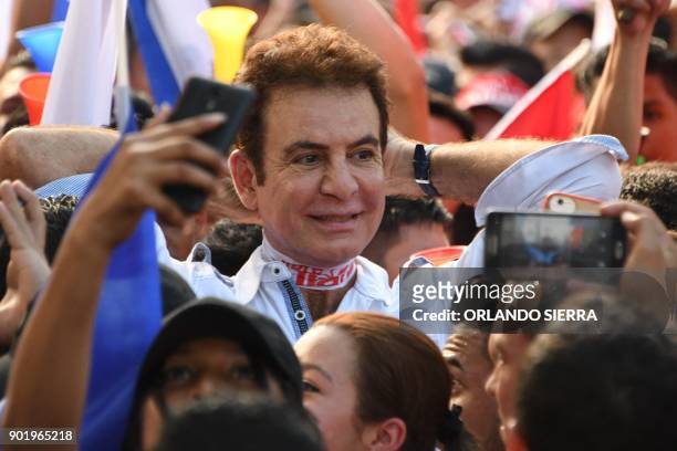 Presidential candidate for the Opposition Alliance Against the Dictatorship, Salvador Nasralla leads a march to claim Honduras' presidency in San...