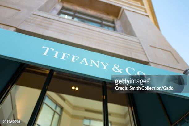 Close-up of sign on distinctive blue awning at the Tiffany and Co luxury jewelry store in downtown Walnut Creek, California, November 17, 2017.