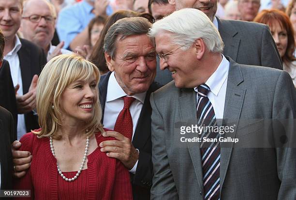 Gerrman Vice Chancellor, Foreign Minister and lead candidate of the German Social Democrats Frank-Walter Steinmeier chats with former German...