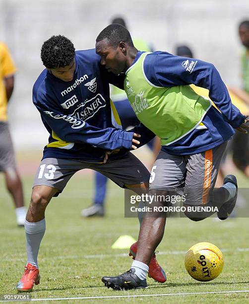 Ecuadorean footballers Joao Rojas and Walter Ayovi during a training session on August 31 2009 in Quito. Ecuador will face Colombia September 5 in a...
