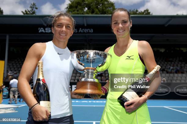 Sara Errani of Italy and Bibiane Schoofs of Netherlands pose with the trophy as they celebrate their Womens Doubles Final win against Eri Hozumi and...