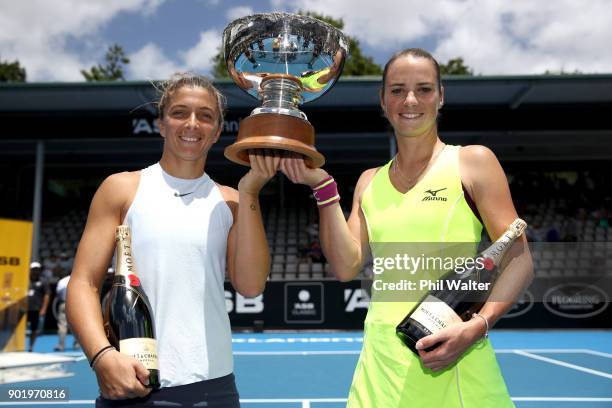 Sara Errani of Italy and Bibiane Schoofs of Netherlands pose with the trophy as they celebrate their Womens Doubles Final win against Eri Hozumi and...