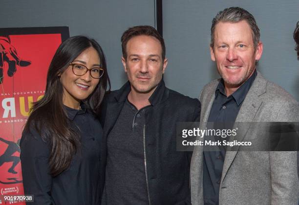 Guest, Director Bryan Fogel and Former Cyclist Lance Armstrong attend the "Icarus" New York Screening at 1 Hotel Brooklyn Bridge on January 6, 2018...