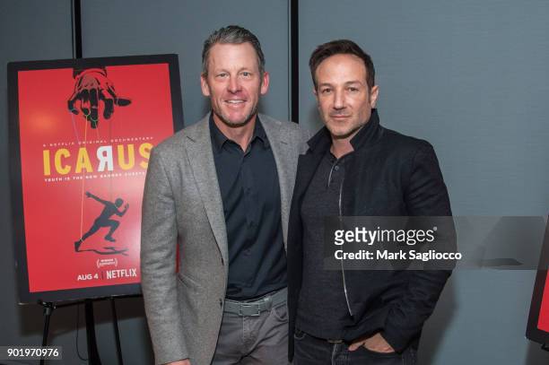 Former Cyclist Lance Armstrong and Director Bryan Fogel attend the "Icarus" New York Screening at 1 Hotel Brooklyn Bridge on January 6, 2018 in the...