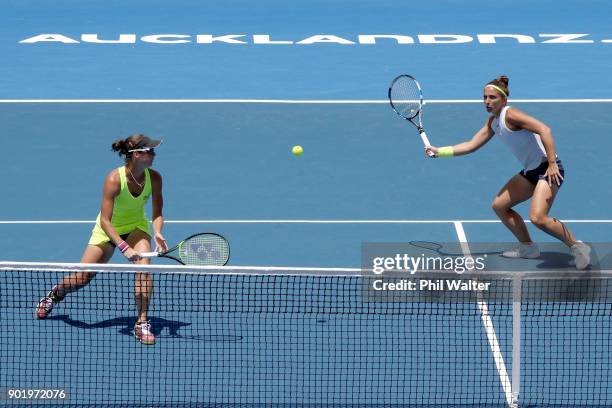 Sara Errani of Italy and Bibiane Schoofs of Netherlands in action during their Womens Doubles Final against Eri Hozumi and Miyu Kato of Japan during...