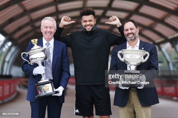 Jo-Wilfried Tsonga of France poses with Acting Sports Minister Philip Dalidakis and Australian Open Tournament Director Craig Tiley ahead of the 2018...