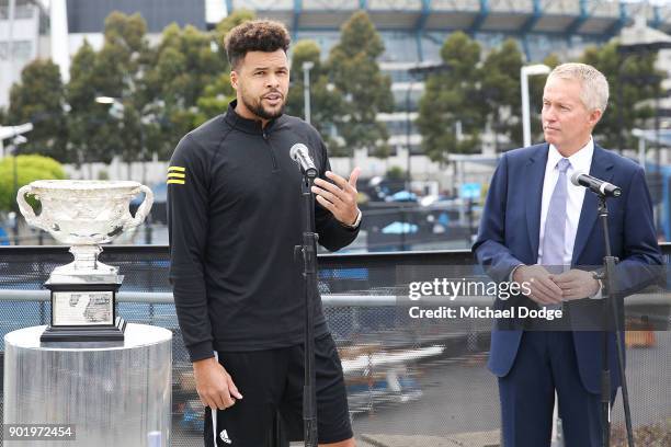 Jo-Wilfried Tsonga of France speaks to media with Australian Open Tournament Director Craig Tiley ahead of the 2018 Australian Open at Melbourne Park...