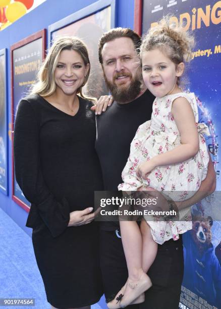 Abigail Ochse, actor A. J. Buckley, and Willow Phoenix Buckley arrive at the premiere of Warner Bros. Pictures' "Paddington 2" at Regency Village...