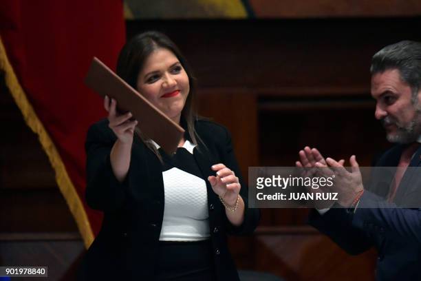 Newly appointed Ecuadorean Vice-President Maria Alejandra Vicuna is greeted by the president of the National Assembly Jose Serrano, during the...